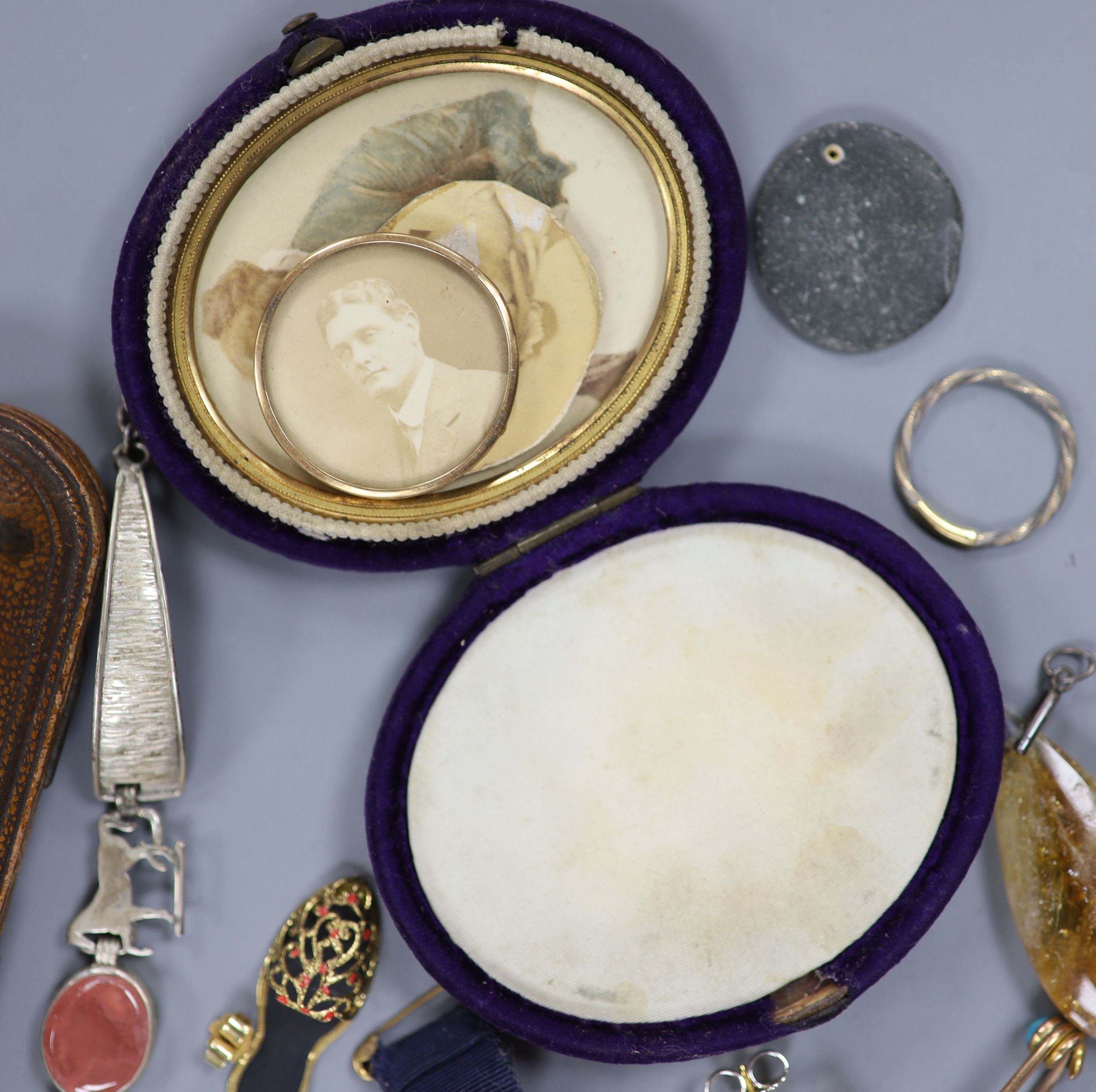 A mixed group of Victorian and later jewellery etc. including a white metal and diamond line pendant(a.f.), a lapis lazuli and diamond chip set cufflink, a small pair of two stone diamond earrings and a diamond set fox h